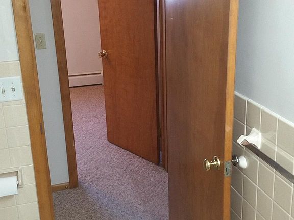 Bathroom exit across hall is Bedroom 2 