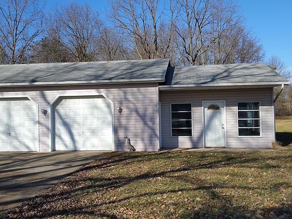 2 bays of garage available with attached work area