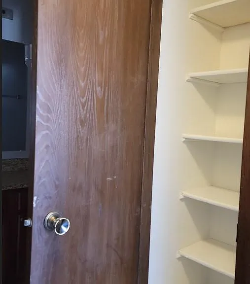 Towel closet next to bathroom