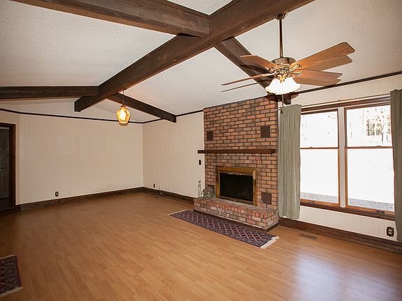 Large Living Room w/ Vaulted Ceiling and Wood Burning Fireplace