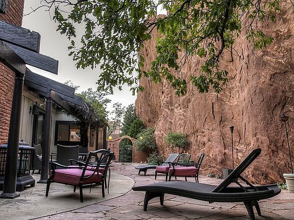 Patio with red rock wall