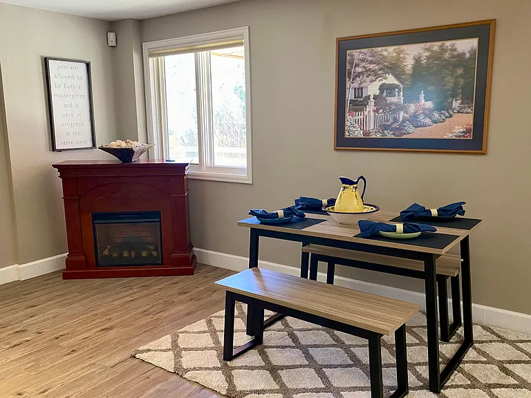 Kitchen table with corner electric fireplace