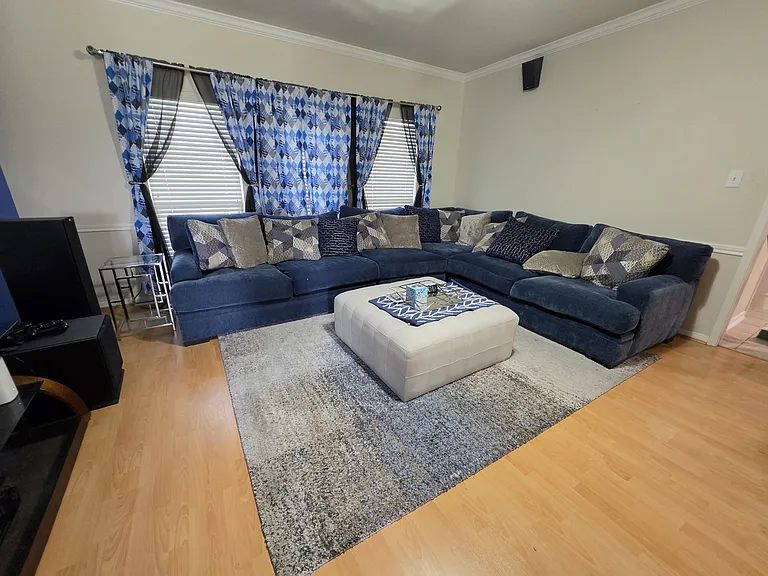 Bright living room with an open layout offers endless space for entertaining and quiet relaxation