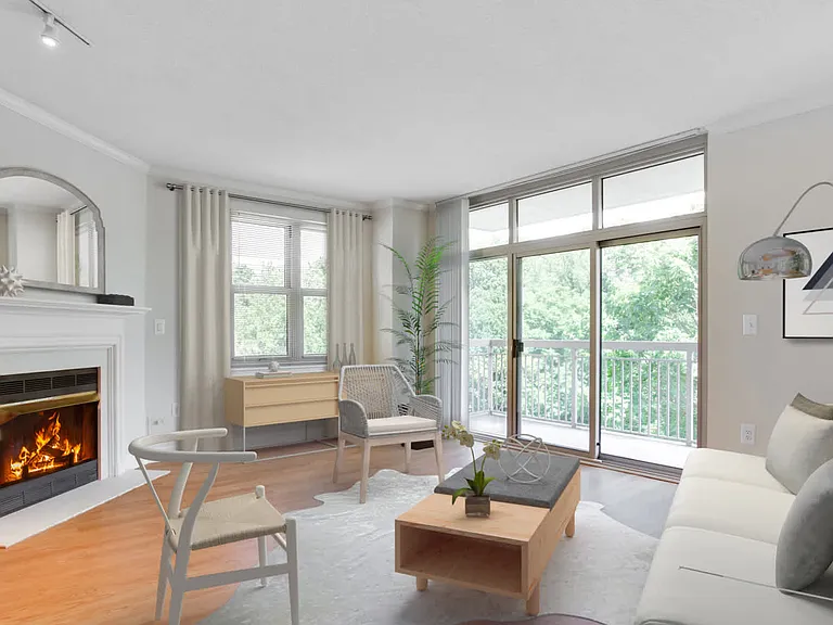 Living Room with 9 Foot Ceilings, Hard Surface Flooring, Gas Fireplace and Private Balcony