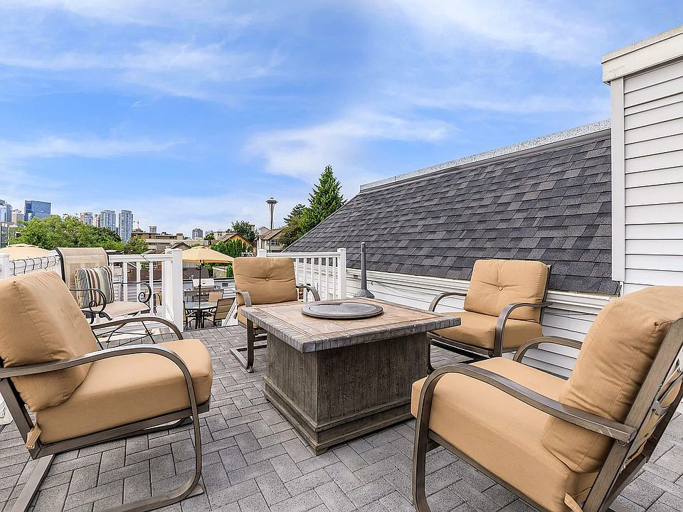 Relax and unwind on this elegant rooftop terrace with stunning city views.