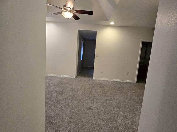 VIEW FROM LIVING ROOM TO DINING ROOM.