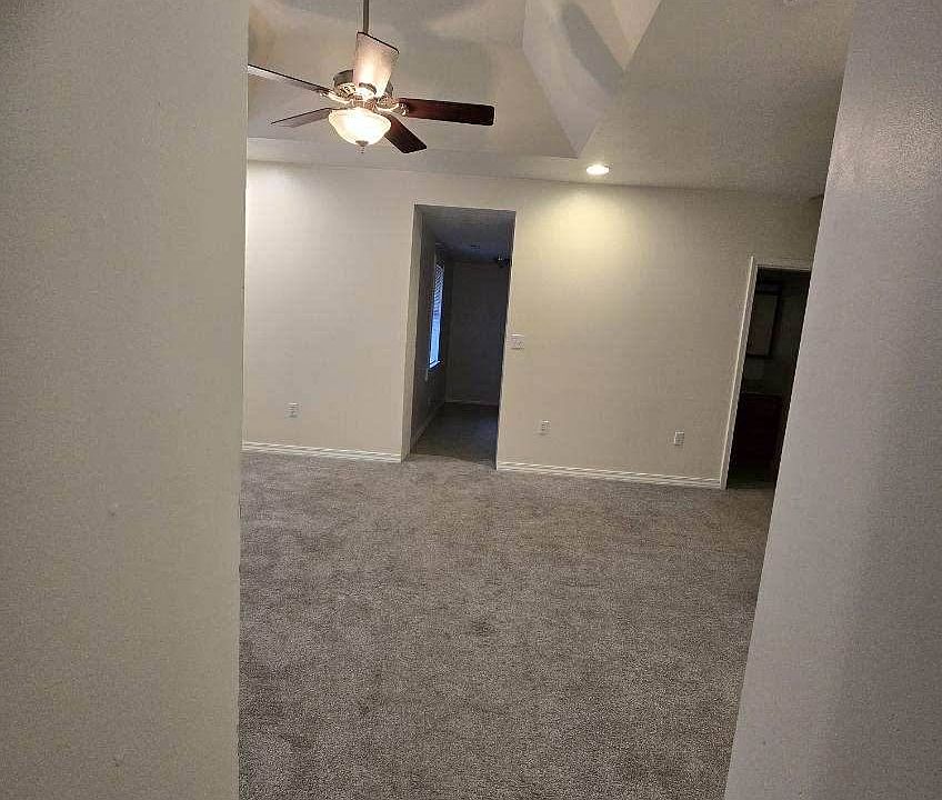 VIEW FROM LIVING ROOM TO DINING ROOM.