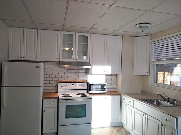 Kitchen with new cabinets, sunny in the afternoons