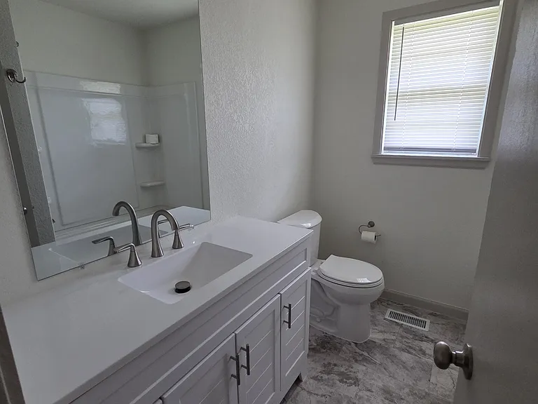 717 E 56th Ave — Photo 14