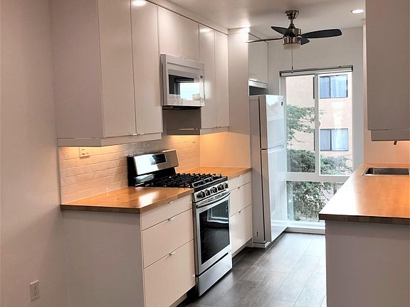 More than ample cabinet space. The back splash is all hand-made tiles.