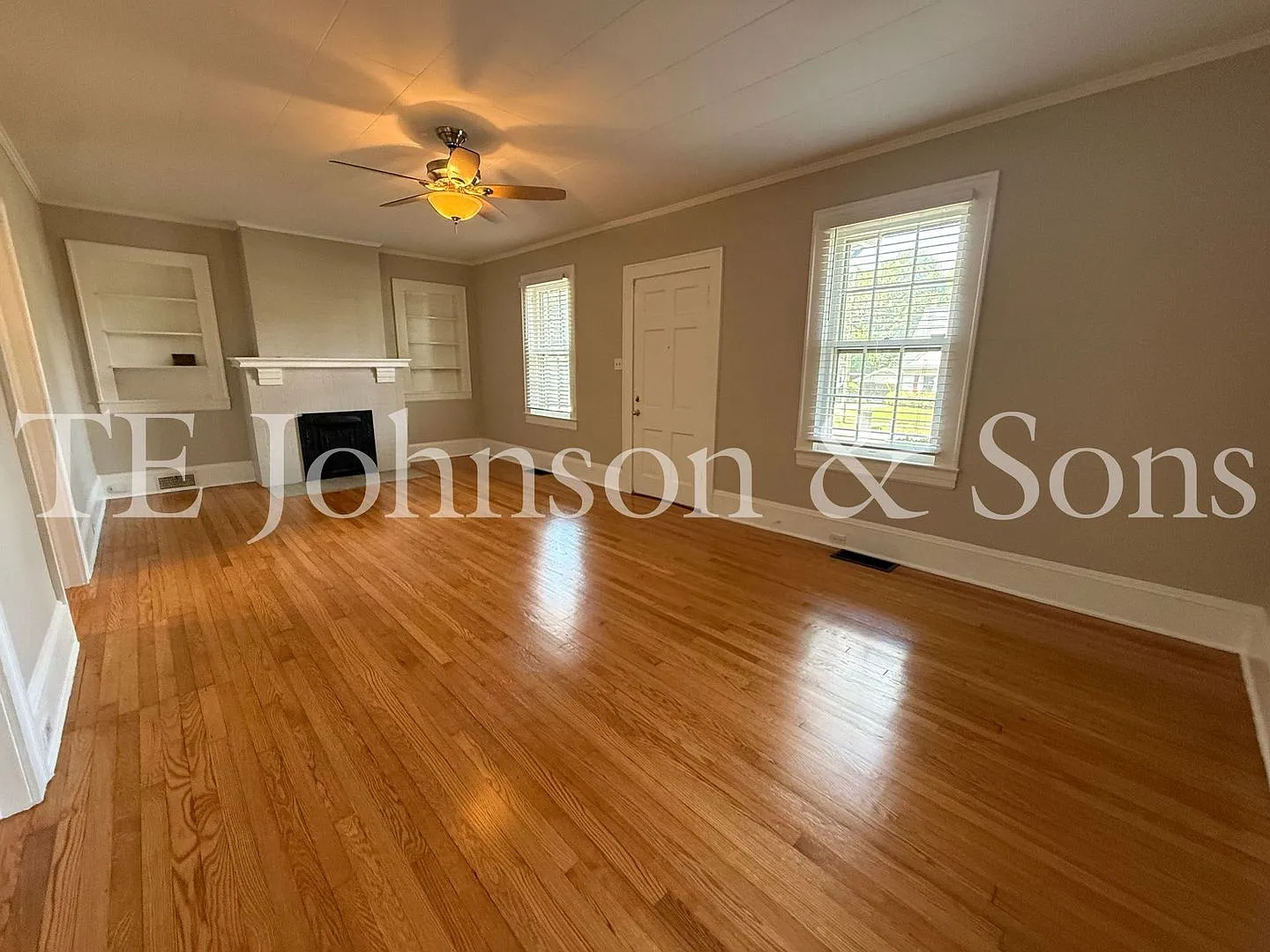 Charming 4-Bedroom Home with Hardwood Floors, Detached Garage & Spacious Patio — Photo 3