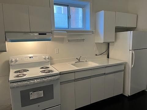 Kitchen. New range and hood. Just renovated.