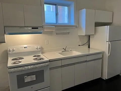 Kitchen. New range and hood. Just renovated.