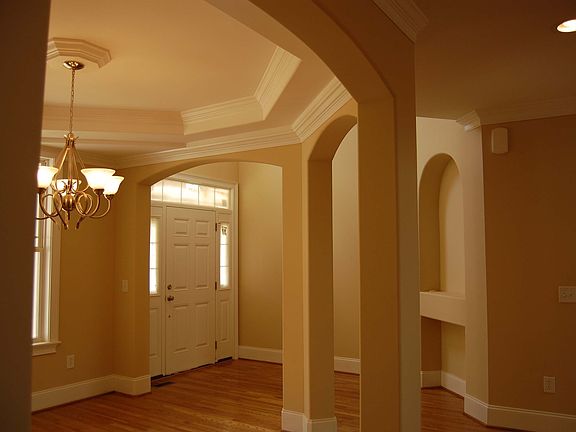 Built ins and detailed trey ceilings