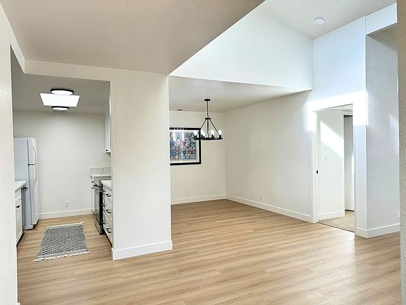 View of Kitchen & Dining rooms from Entry
