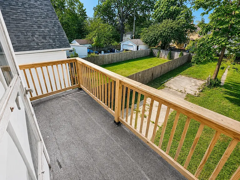 Rear deck overlooking the backyard
