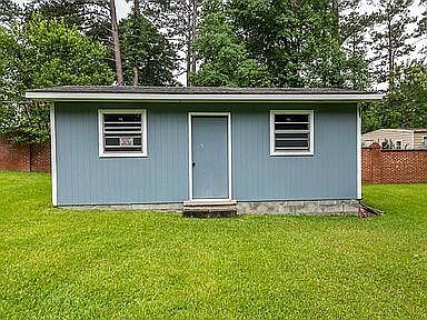 Powered workshop/storage shed
