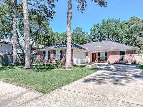 This home sits on a large lot with ample yard space in front and the back, lush landscaping and well-maintained yard!