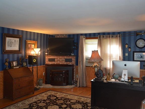 Living Room with Pellet Stove fireplace