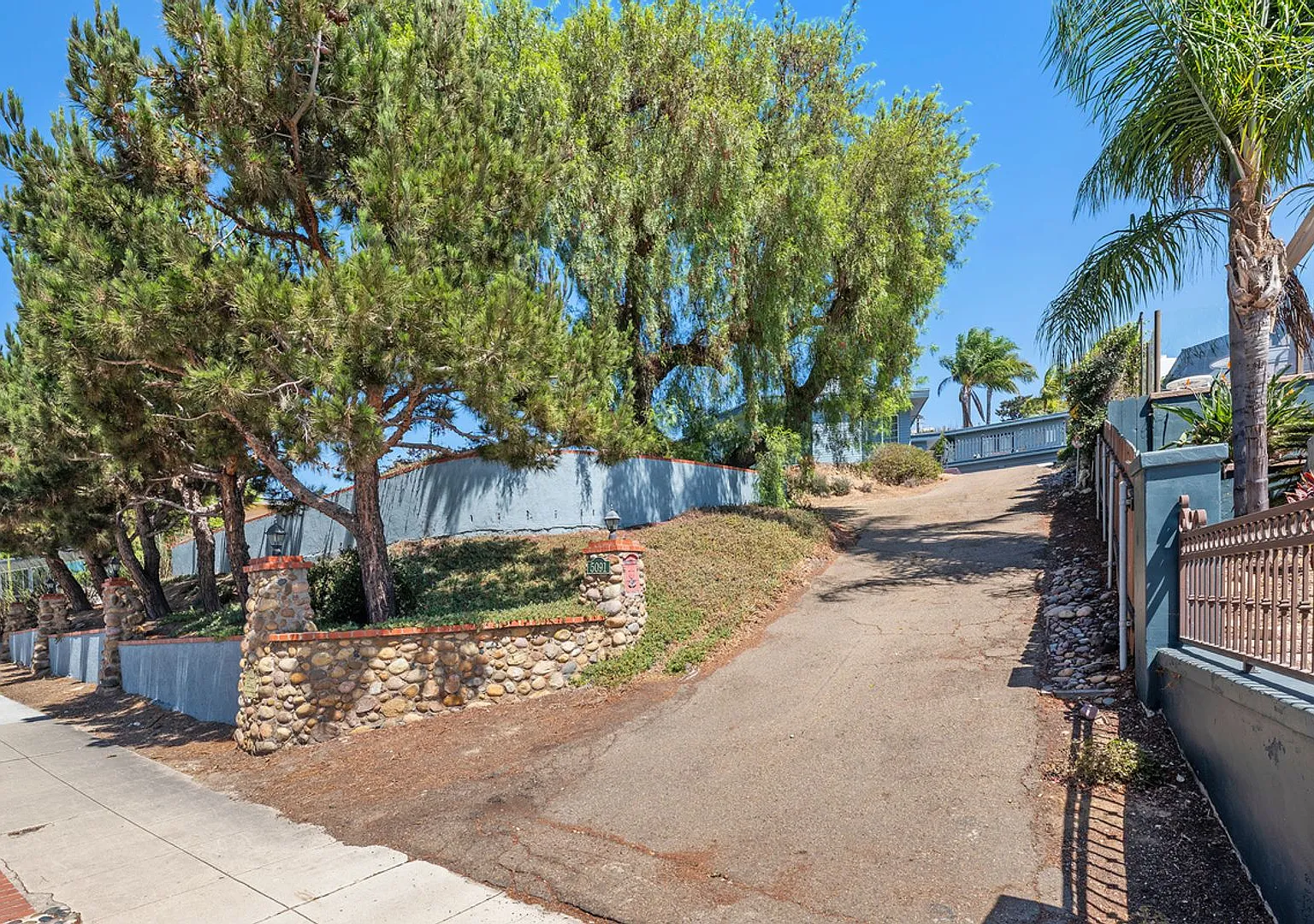 Bright Open Layout with Partial Ocean Views! — Photo 3