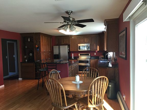 Kitchen and dining room are open to family room area. Kitchen also has an eat in area