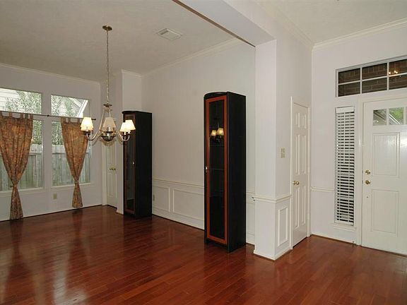 Enter in the front door to find yourself looking into the Formal dining area on your right with lovely hardwood floors.  So elegant and roomy.