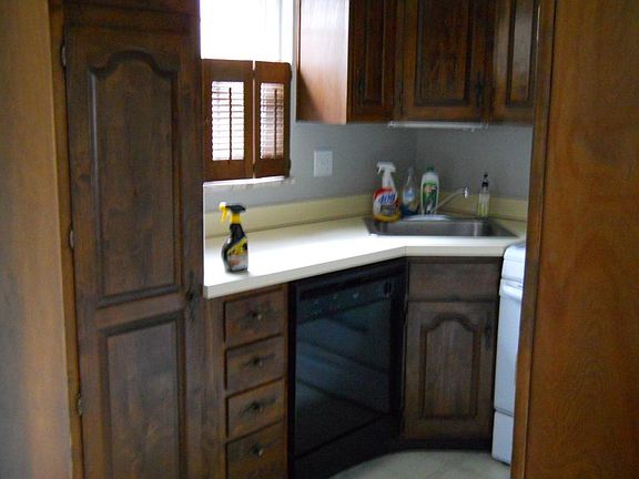 Kitchen Window with Shutters