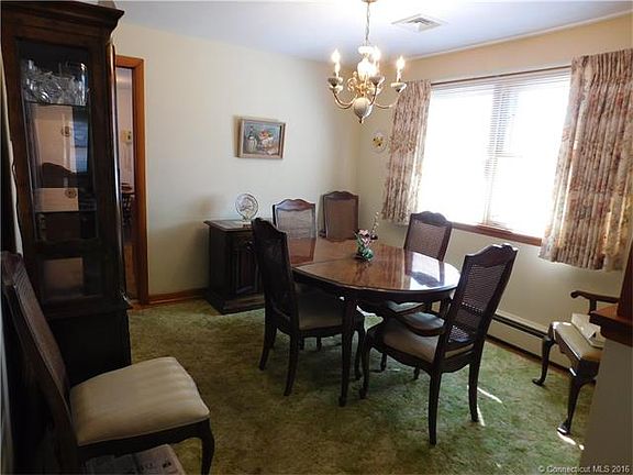 Dining room with hardwood f...