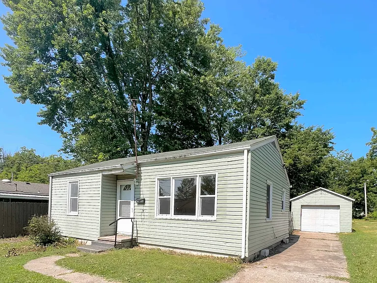 The house has a detached garage