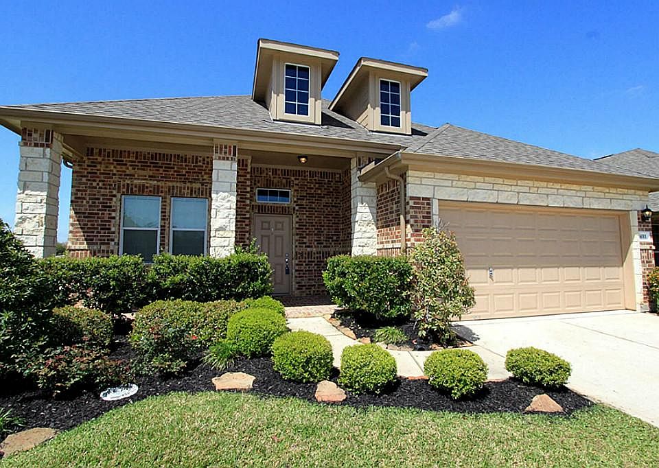 Welcome home to 14311 Heath Falls Ln!