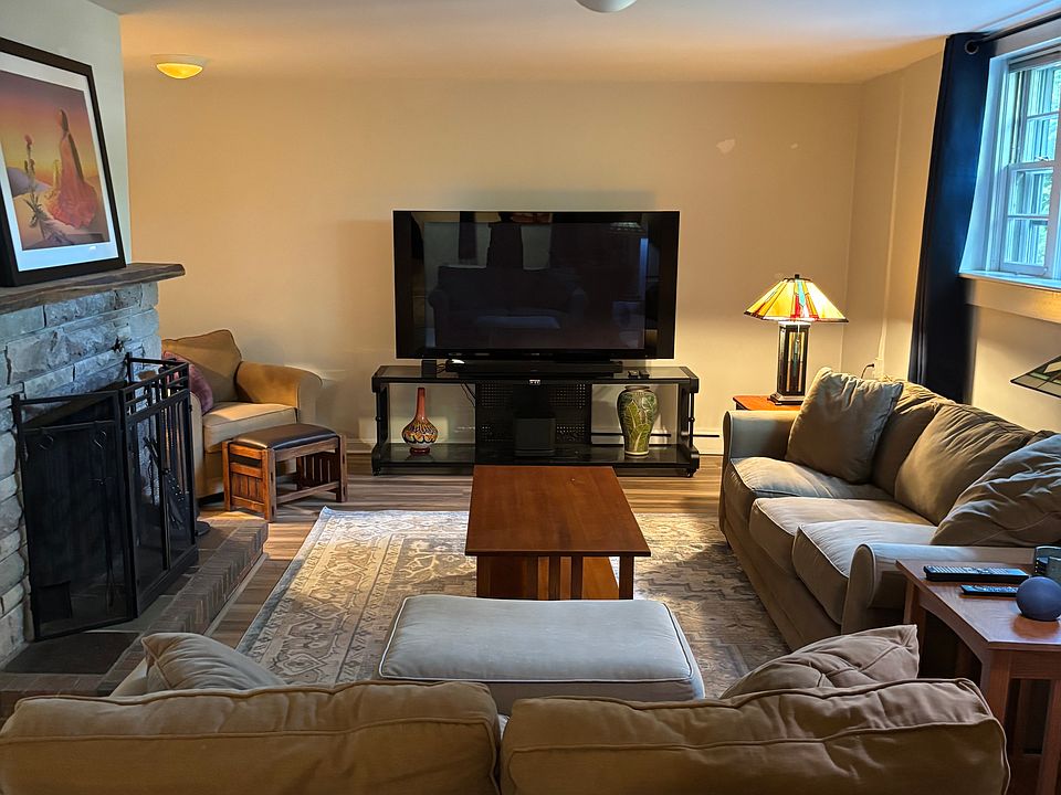 Living Room with Granite Fireplace