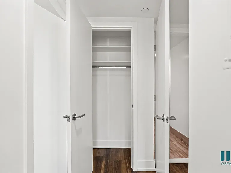 Bedroom with Multiple Hanging Closets