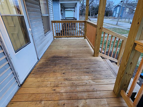 Spacious front porch area to enjoy the neighborhood