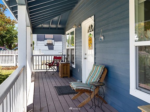 Enjoy the warm summer evenings from the covered front porch.>