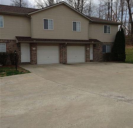 ample parking in a quiet wooded setting