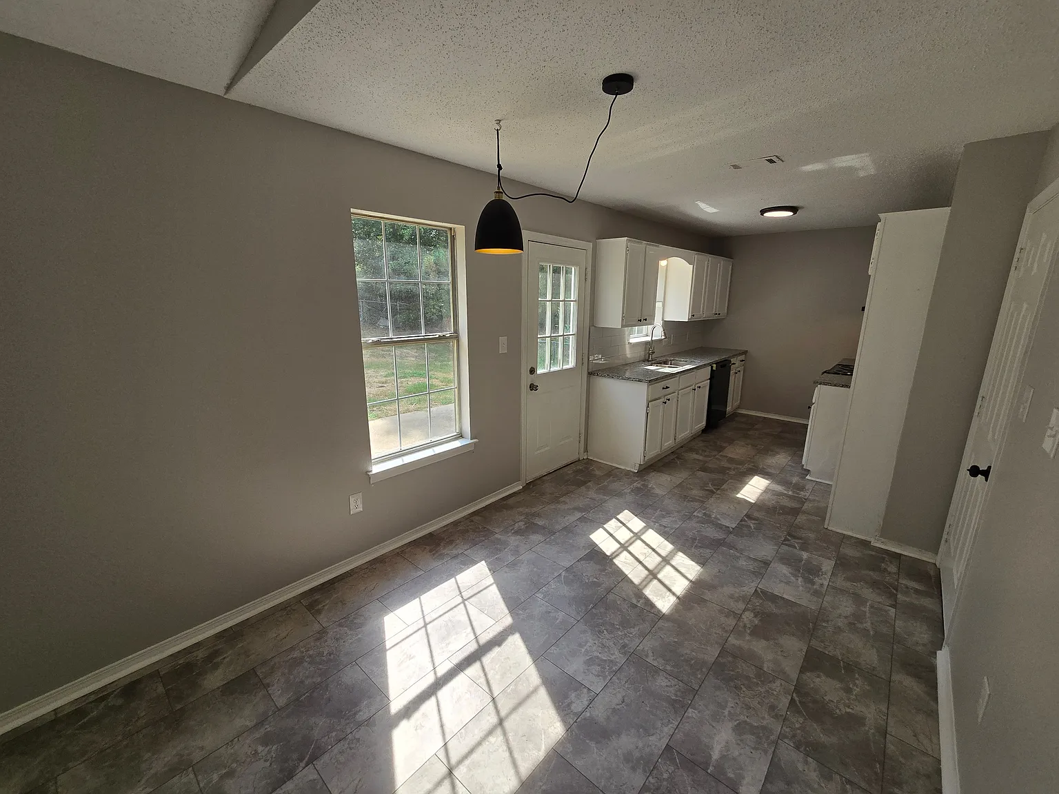 Charming 3-Bed, 2-Bath Home with Private Yard and Ample Parking — Photo 4