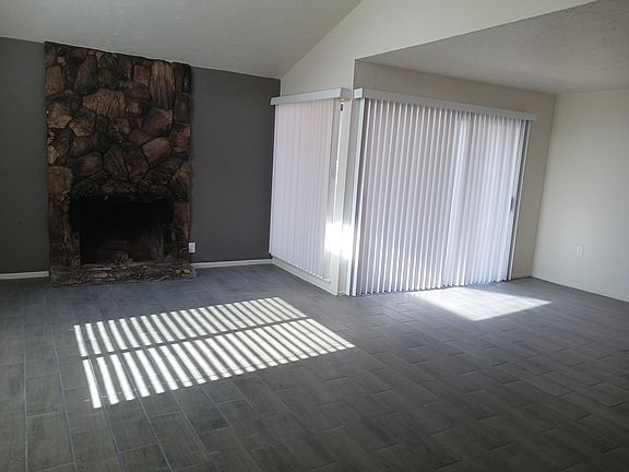 Living room with gas fireplace.