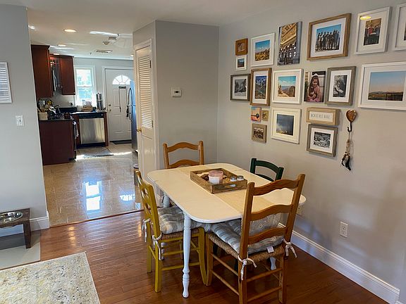 Dining area looking into kitchen.