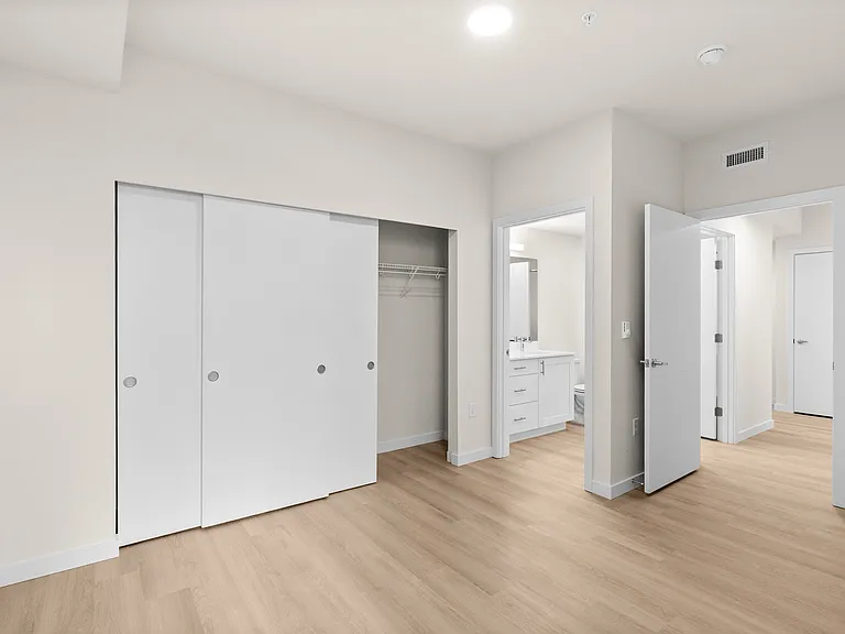 Relax and recharge in a spacious bedroom built for modern living Relax and recharge in a spacious bedroom built for modern living