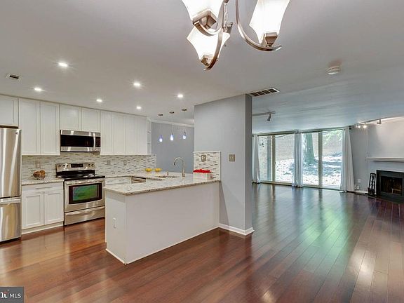 Beautiful renovated kitchen with hardwood floors