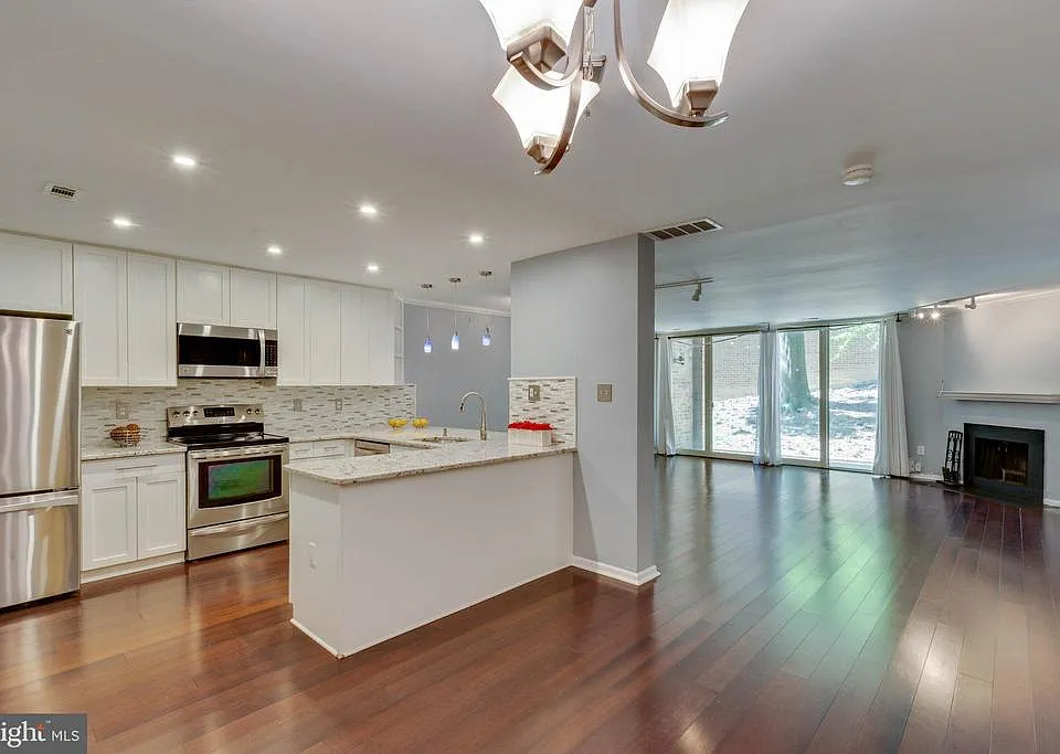 Beautiful renovated kitchen with hardwood floors