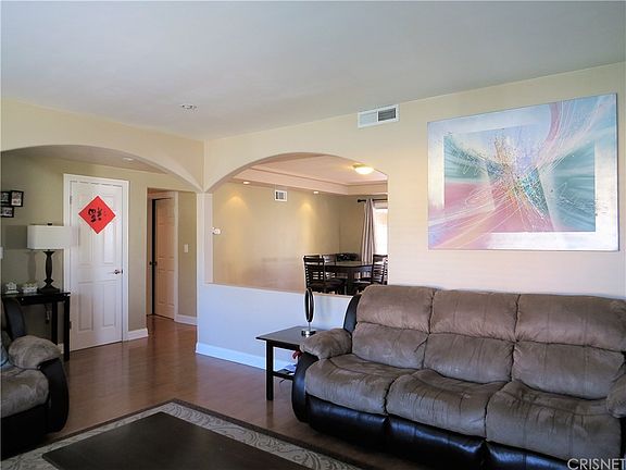 In the living room, looking back toward the formal