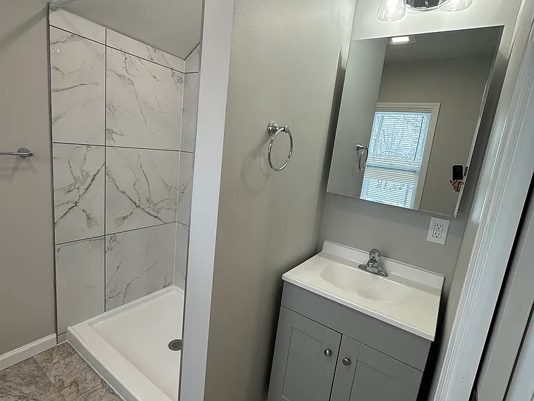 64 E Oneida St — Photo 11