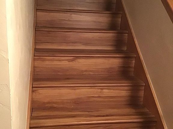 Laminate stairs from lower level and also from liv. Rm. to upstairs