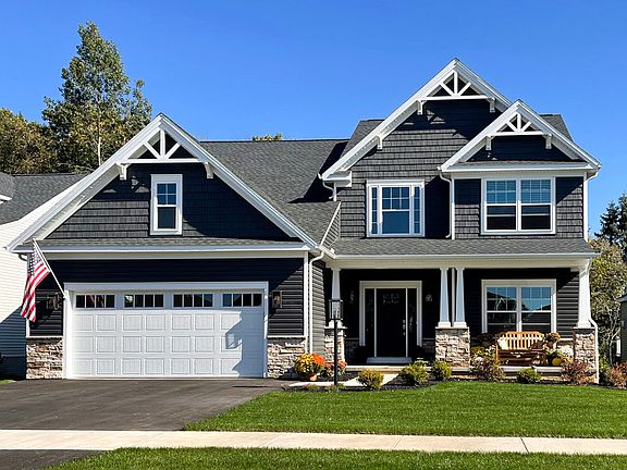 Front exterior view of the Bayberry C with full porch by S A Homes - 2 story home with Craftsman des
