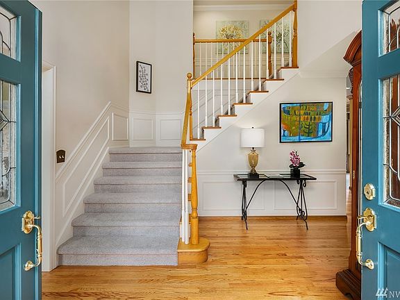 Gleaming hardwoods welcome you into the spacious foyer.