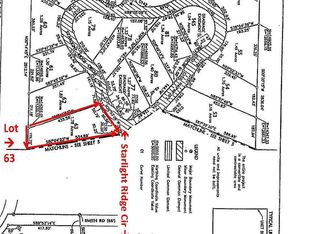 63 Starlight Ridge Cir, Onekama, MI 49675