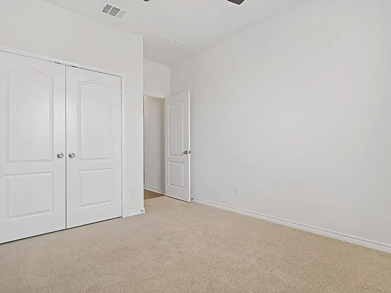 Front bedroom that shares full bathroom