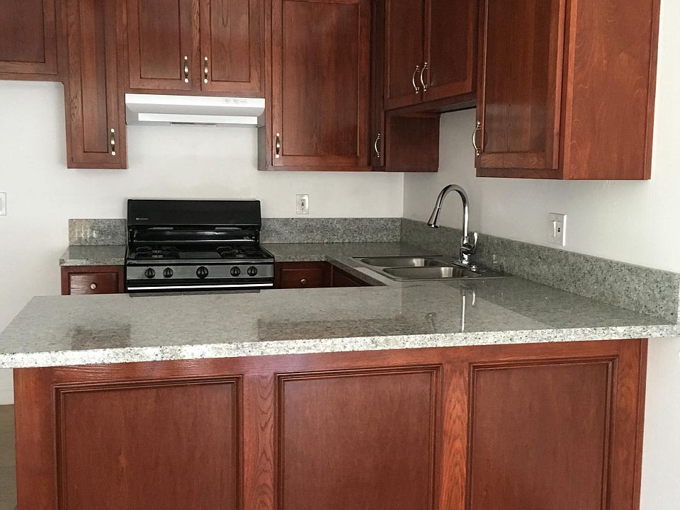 Beautiful wood cabinetry with granite countertops