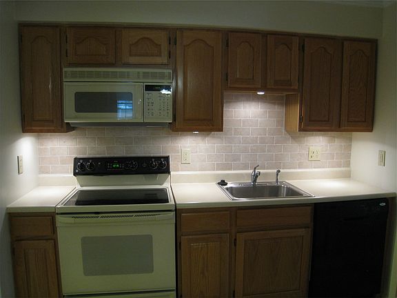 Beautiful Under Cabinet Lighting with Ceramic Tile Backsplas